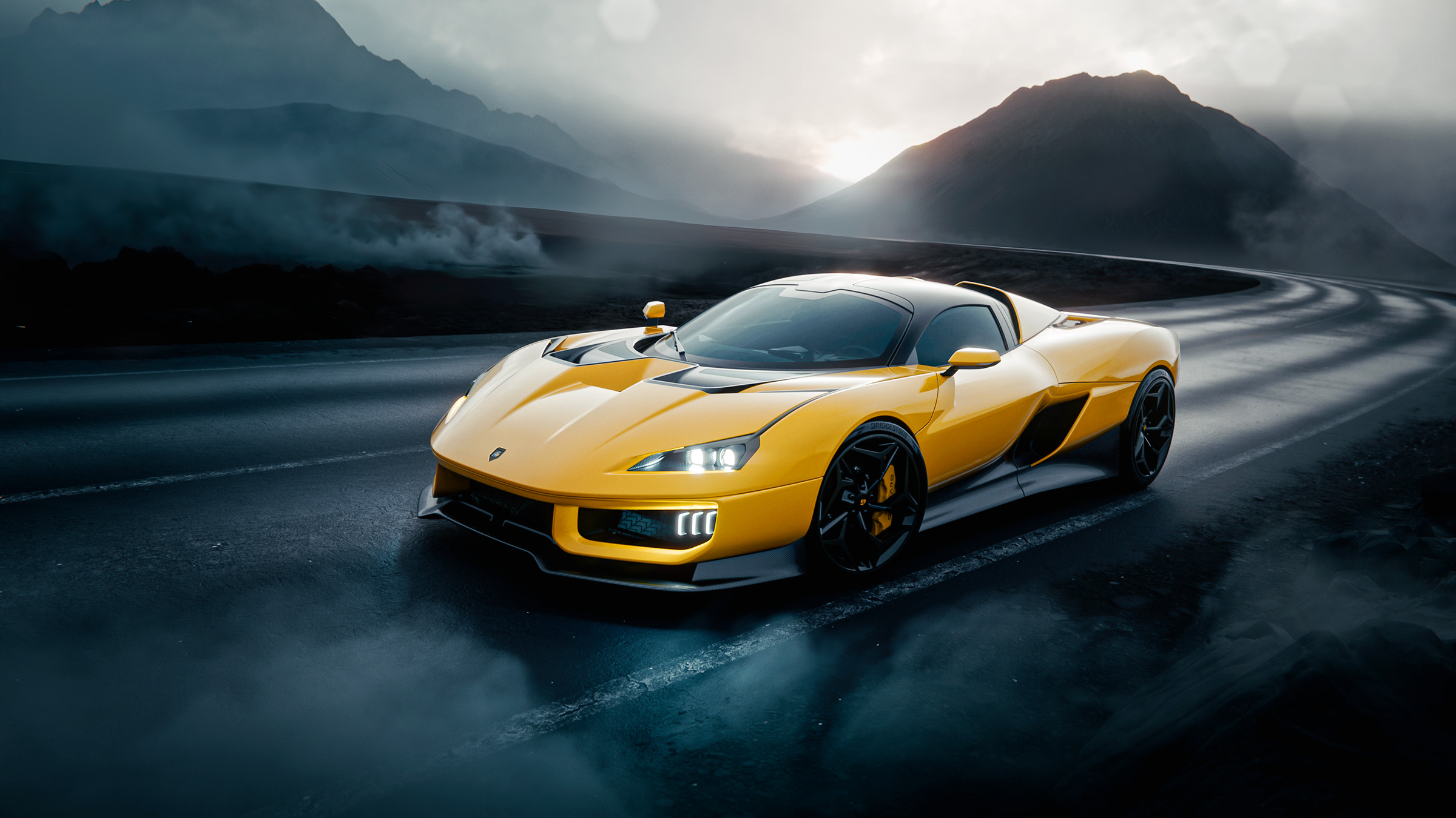 Giamaro Krafla in yellow on a mountain road — front view showing aggressive aerodynamic design